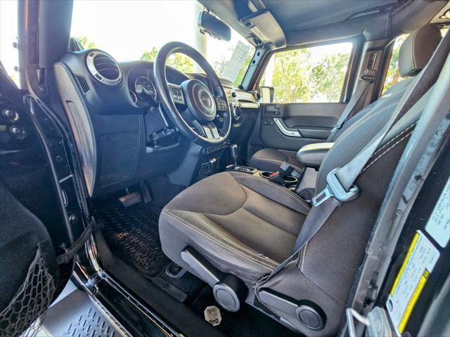 used 2014 Jeep Wrangler Unlimited car, priced at $22,980