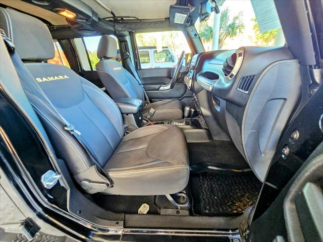 used 2014 Jeep Wrangler Unlimited car, priced at $22,980