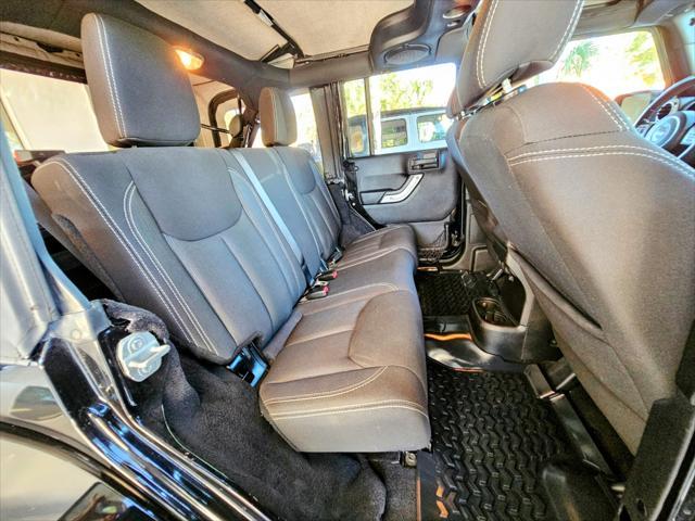 used 2014 Jeep Wrangler Unlimited car, priced at $22,980