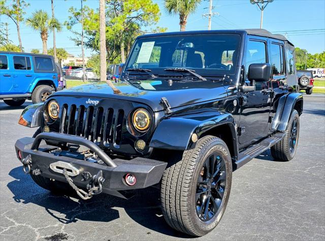 used 2014 Jeep Wrangler Unlimited car, priced at $22,980