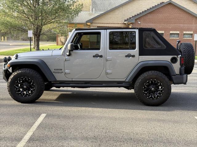 used 2014 Jeep Wrangler Unlimited car, priced at $16,995