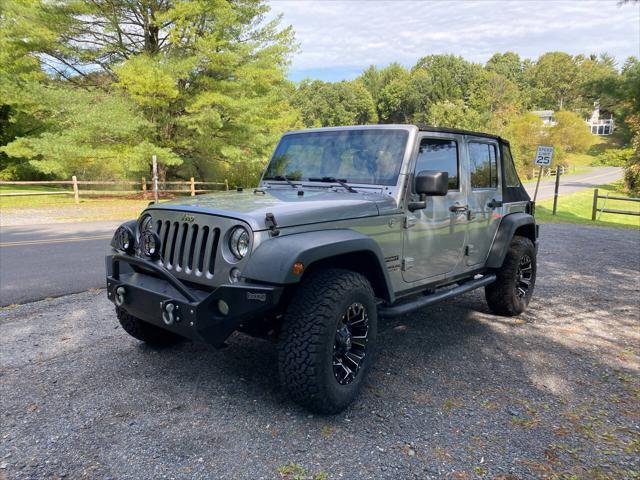 used 2014 Jeep Wrangler Unlimited car, priced at $21,995