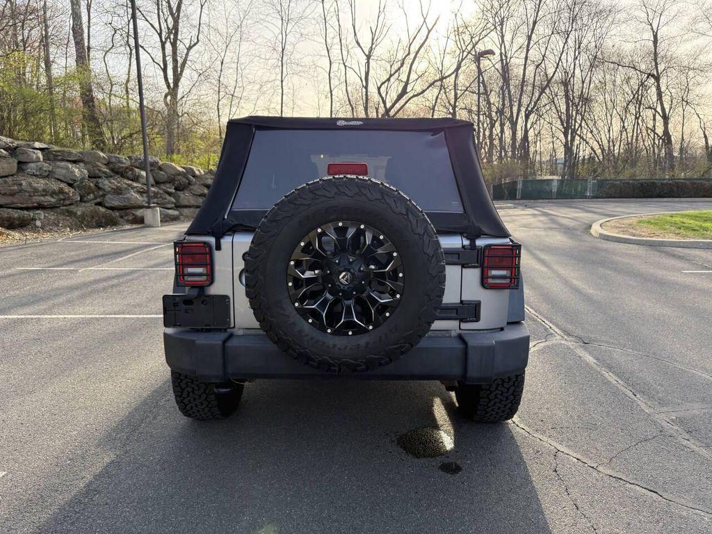 used 2014 Jeep Wrangler Unlimited car, priced at $15,995