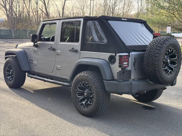 used 2014 Jeep Wrangler Unlimited car, priced at $16,995