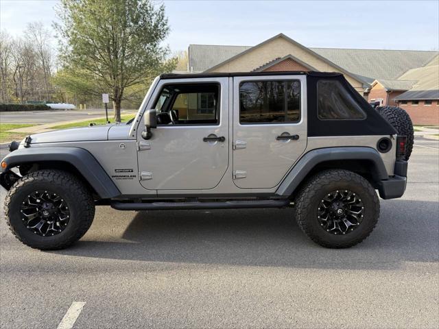 used 2014 Jeep Wrangler Unlimited car, priced at $16,995
