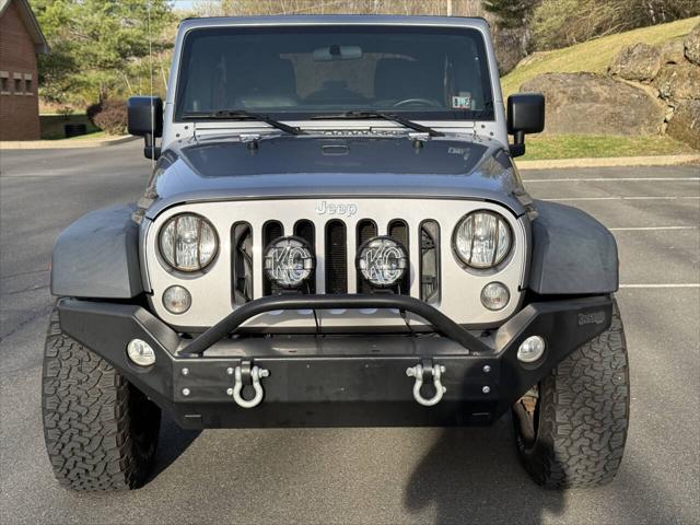 used 2014 Jeep Wrangler Unlimited car, priced at $16,995