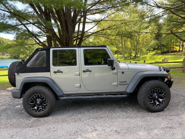 used 2014 Jeep Wrangler Unlimited car, priced at $21,995