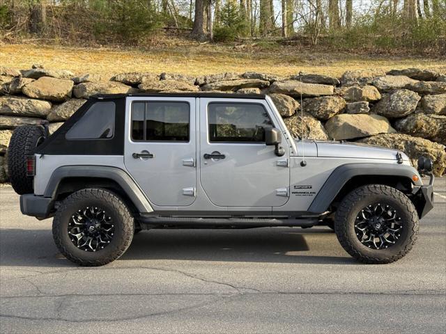 used 2014 Jeep Wrangler Unlimited car, priced at $16,995