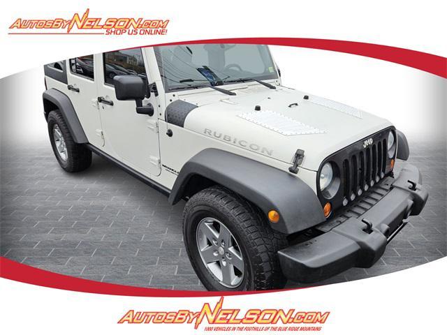 used 2010 Jeep Wrangler Unlimited car, priced at $15,992