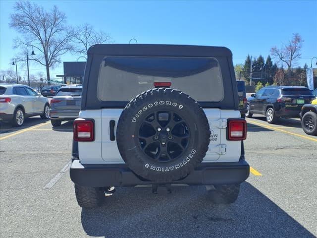 used 2021 Jeep Wrangler Unlimited car, priced at $33,400