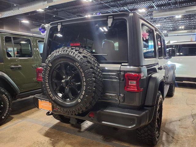 used 2021 Jeep Wrangler Unlimited car, priced at $31,018