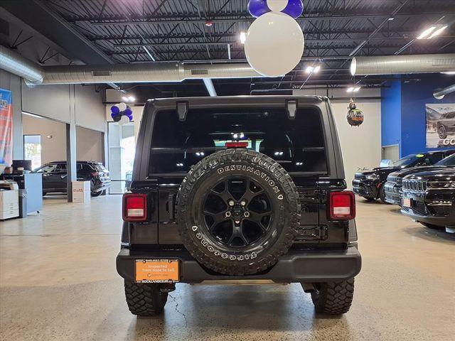 used 2023 Jeep Wrangler car, priced at $31,241