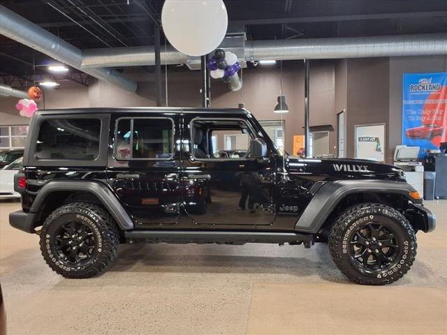 used 2023 Jeep Wrangler car, priced at $31,241