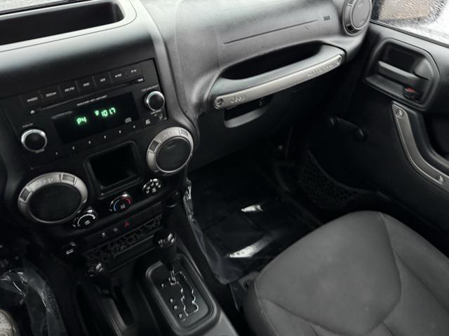 used 2015 Jeep Wrangler Unlimited car, priced at $15,998