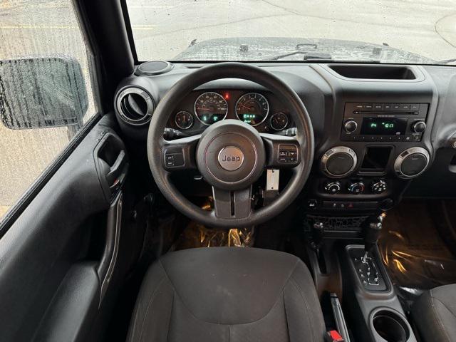 used 2015 Jeep Wrangler Unlimited car, priced at $15,998