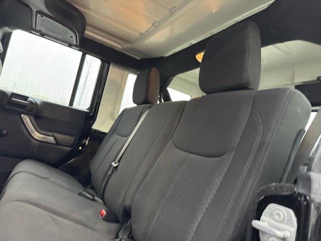 used 2015 Jeep Wrangler Unlimited car, priced at $15,998