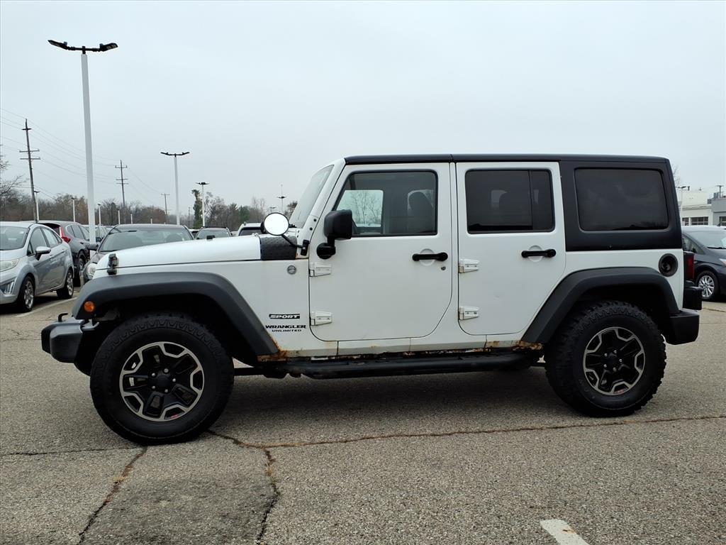 used 2011 Jeep Wrangler Unlimited car, priced at $6,995