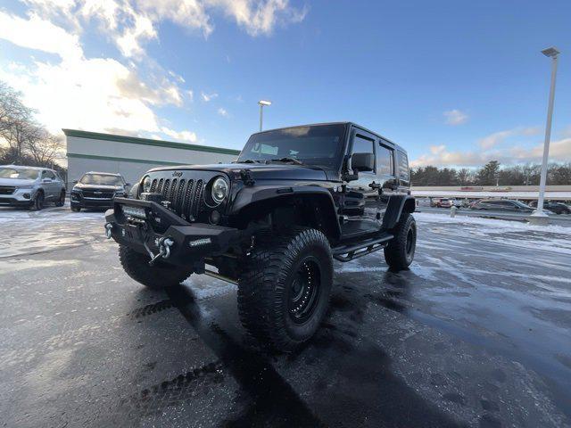 used 2011 Jeep Wrangler Unlimited car, priced at $16,983