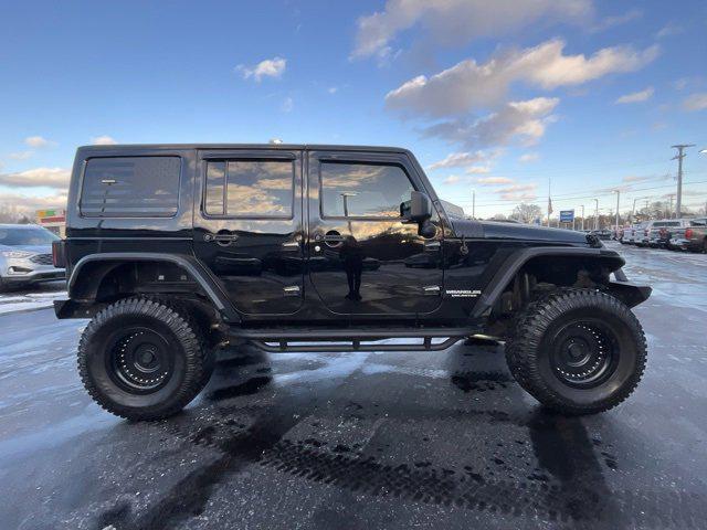 used 2011 Jeep Wrangler Unlimited car, priced at $16,983