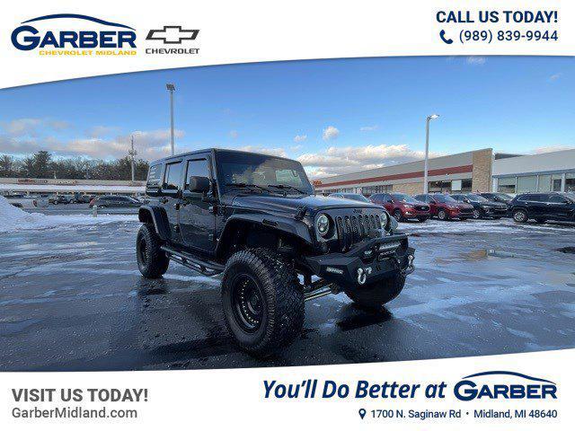 used 2011 Jeep Wrangler Unlimited car, priced at $16,983