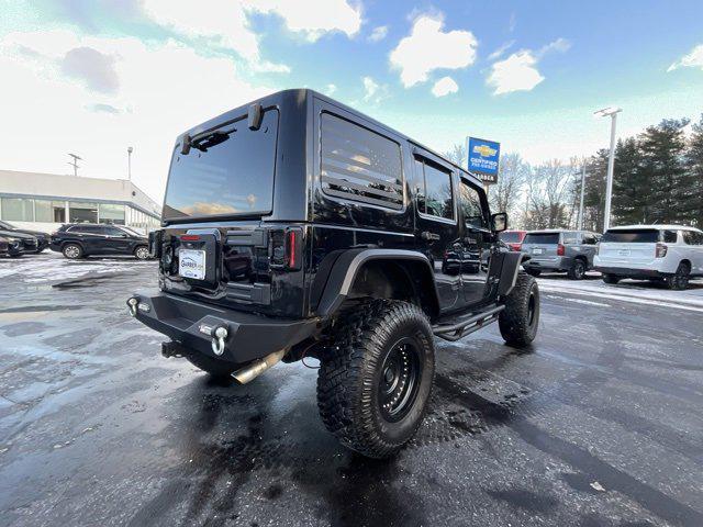 used 2011 Jeep Wrangler Unlimited car, priced at $16,983