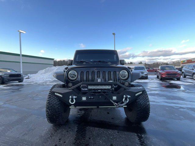 used 2011 Jeep Wrangler Unlimited car, priced at $16,983