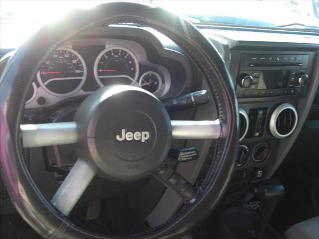 used 2010 Jeep Wrangler Unlimited car, priced at $14,699