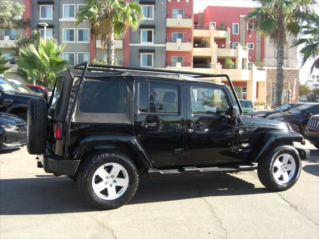 used 2010 Jeep Wrangler Unlimited car, priced at $14,699