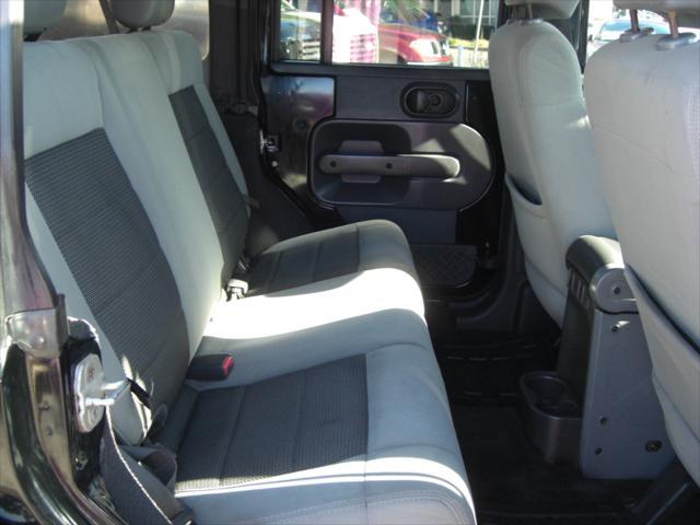 used 2010 Jeep Wrangler Unlimited car, priced at $14,699