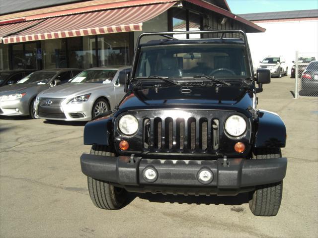 used 2010 Jeep Wrangler Unlimited car, priced at $14,699