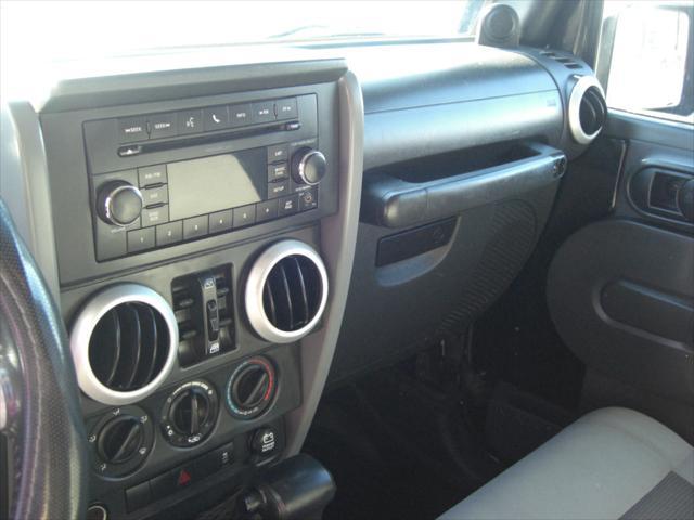 used 2010 Jeep Wrangler Unlimited car, priced at $14,699