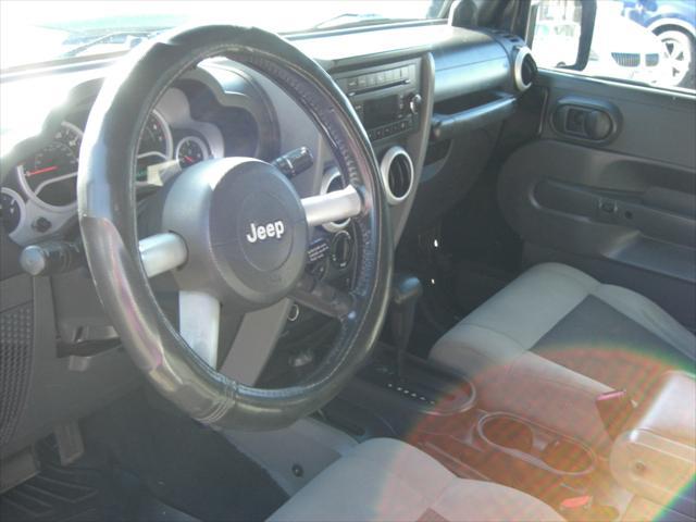 used 2010 Jeep Wrangler Unlimited car, priced at $14,699