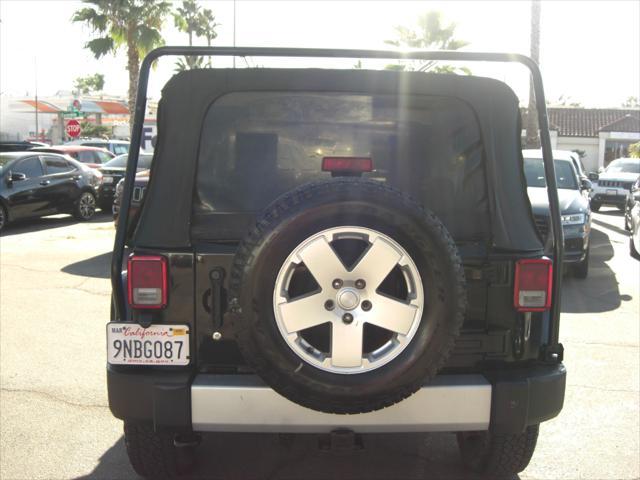 used 2010 Jeep Wrangler Unlimited car, priced at $14,699