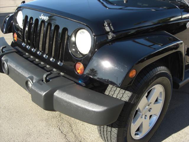 used 2010 Jeep Wrangler Unlimited car, priced at $14,699