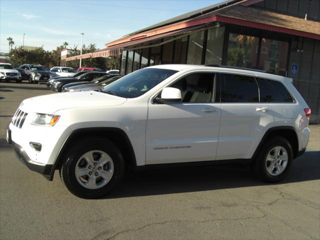 used 2015 Jeep Grand Cherokee car, priced at $11,299