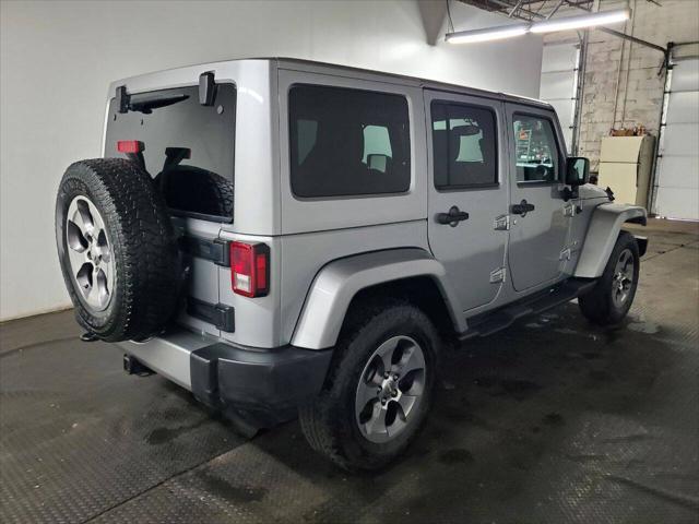 used 2016 Jeep Wrangler Unlimited car, priced at $15,494