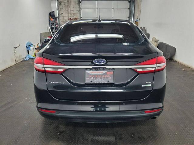 used 2018 Ford Fusion car, priced at $12,499