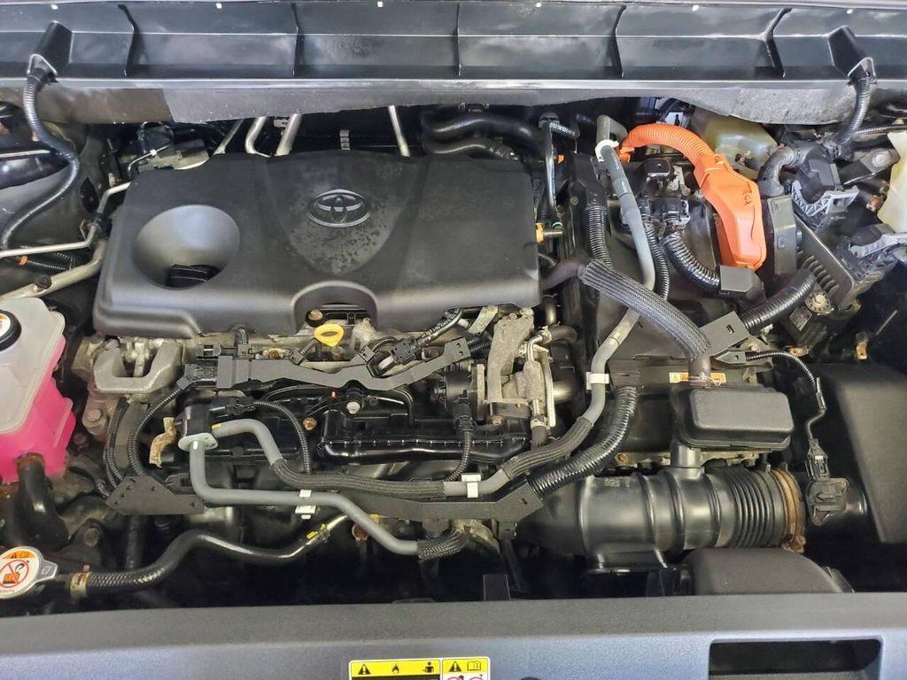 used 2021 Toyota Highlander Hybrid car, priced at $29,994