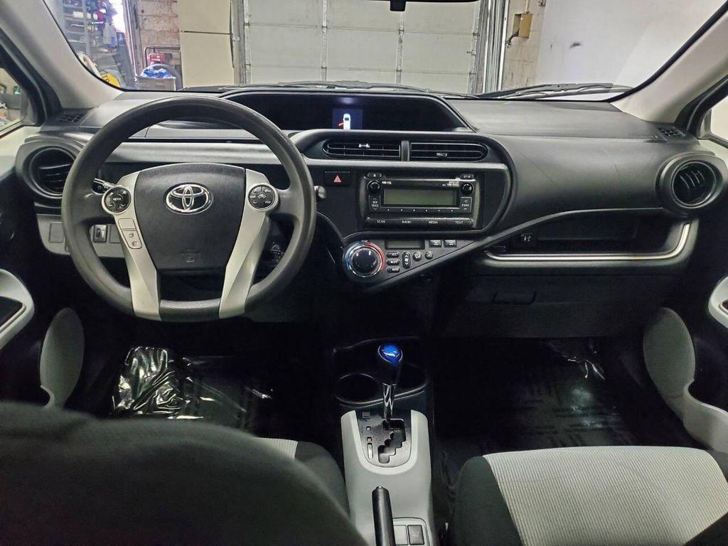 used 2014 Toyota Prius c car, priced at $9,999