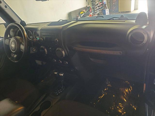 used 2013 Jeep Wrangler Unlimited car, priced at $15,499