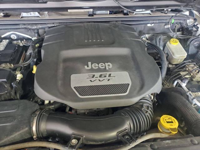 used 2013 Jeep Wrangler Unlimited car, priced at $15,499