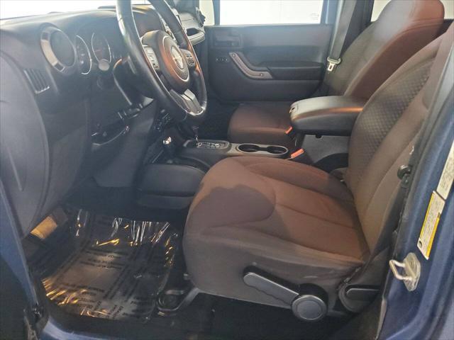 used 2013 Jeep Wrangler Unlimited car, priced at $15,499