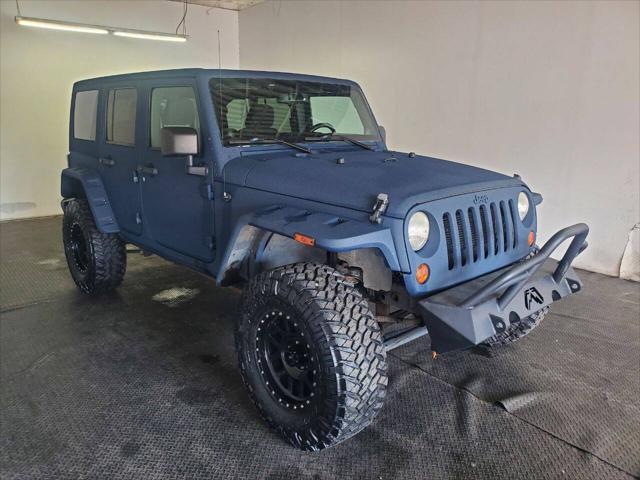 used 2013 Jeep Wrangler Unlimited car, priced at $15,499