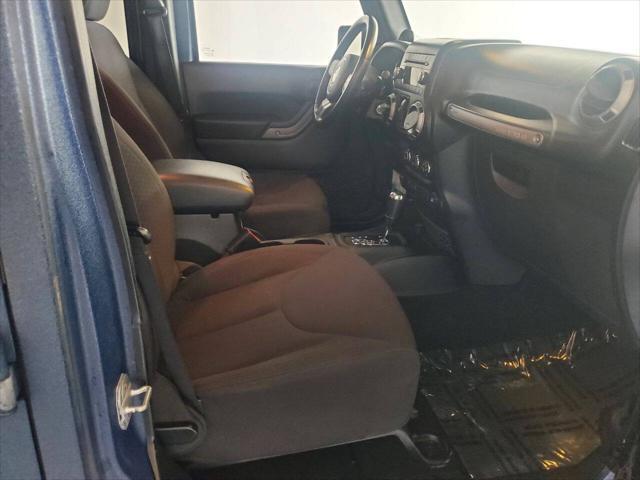 used 2013 Jeep Wrangler Unlimited car, priced at $15,499