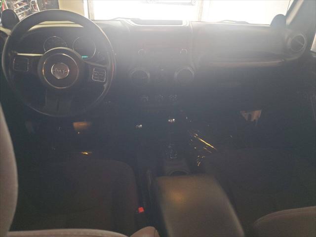 used 2013 Jeep Wrangler Unlimited car, priced at $15,499
