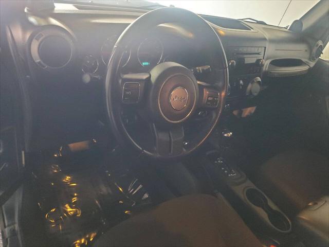 used 2013 Jeep Wrangler Unlimited car, priced at $15,499