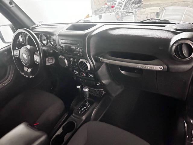 used 2015 Jeep Wrangler Unlimited car, priced at $16,999