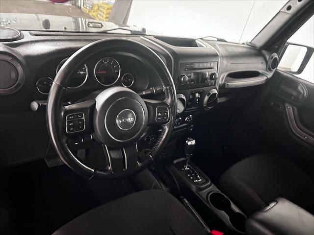 used 2015 Jeep Wrangler Unlimited car, priced at $16,999