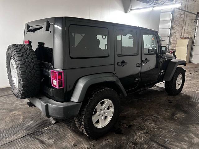 used 2015 Jeep Wrangler Unlimited car, priced at $16,999