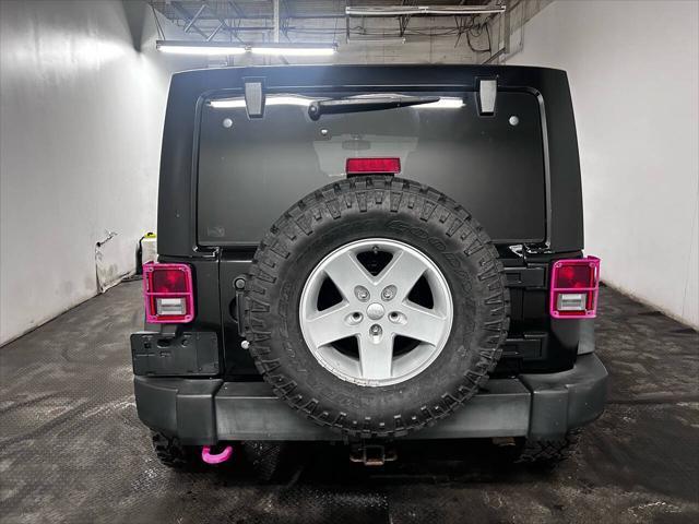 used 2015 Jeep Wrangler Unlimited car, priced at $16,999